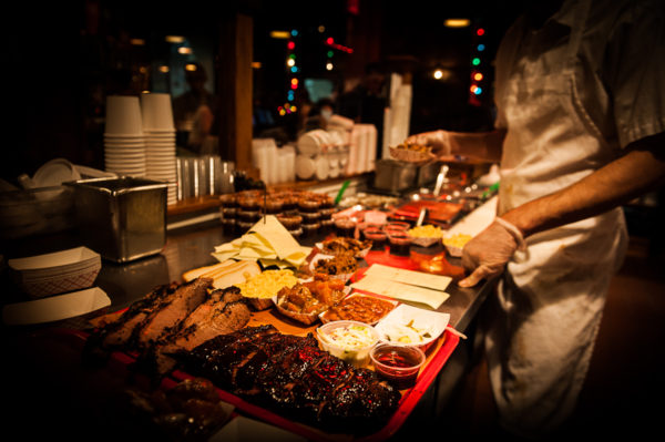 a man preparing food inside of it