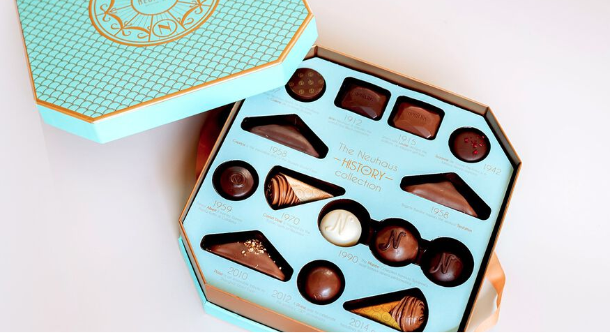 a close up of a box of chocolates