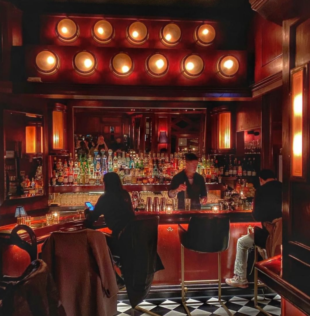 a person sitting at a bar
